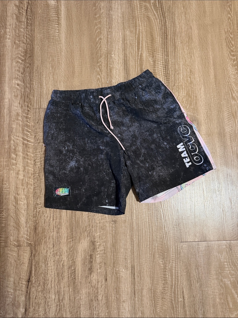 Black Athletic Drawstring Shorts with Pink Trim by